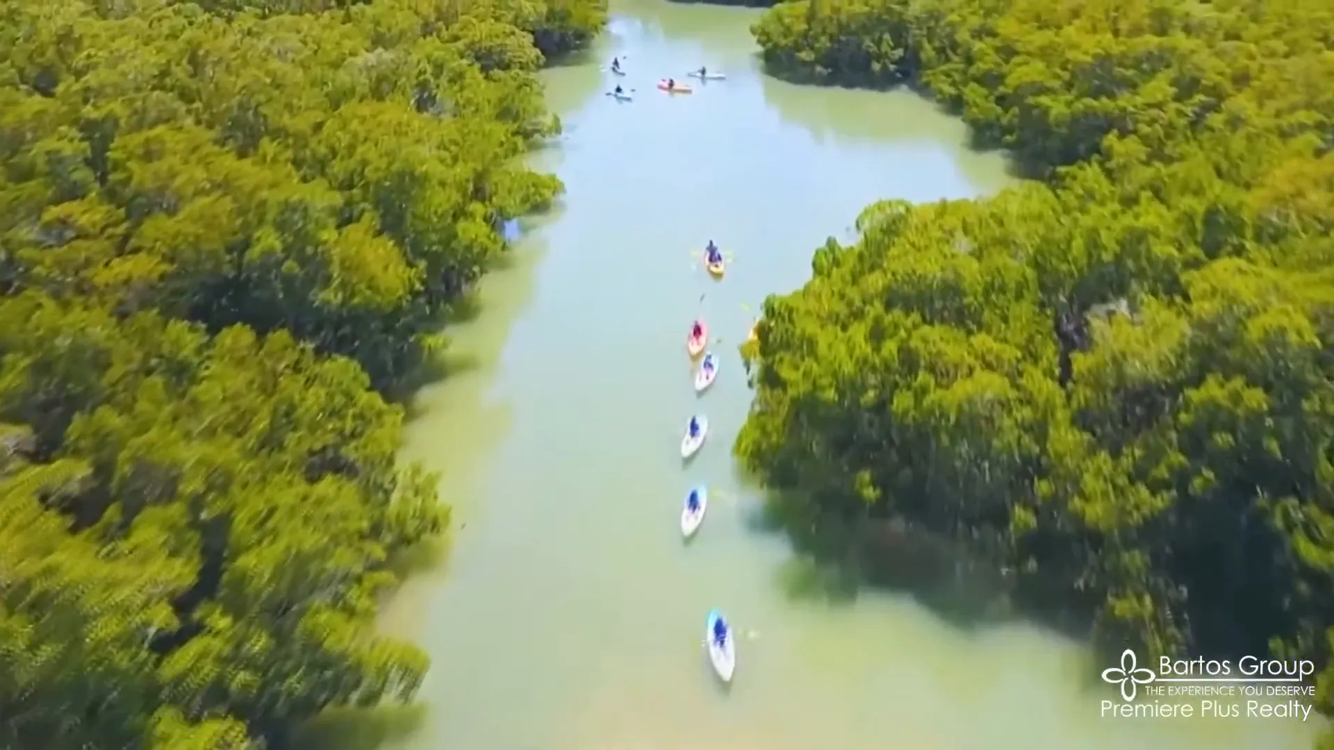 Mary Bartosz and Glenn Liversy standing at Caxambas Pass ready to paddle