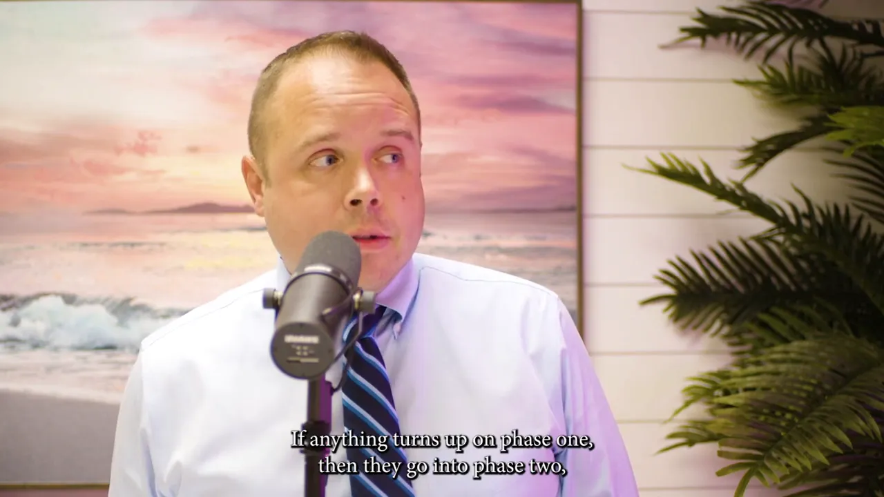 Speaker on a podcast set saying 'I think, the Structural Integrity Reserve' with microphone visible