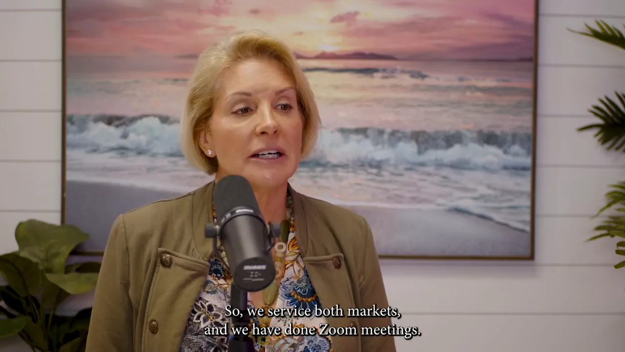 Person speaking into a microphone with an ocean print behind them; subtitle mentions Zoom meetings.