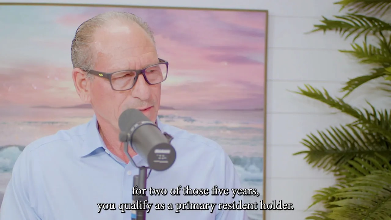 Presenter speaking with subtitle 'for two of those five years, you qualify as a primary resident holder.'