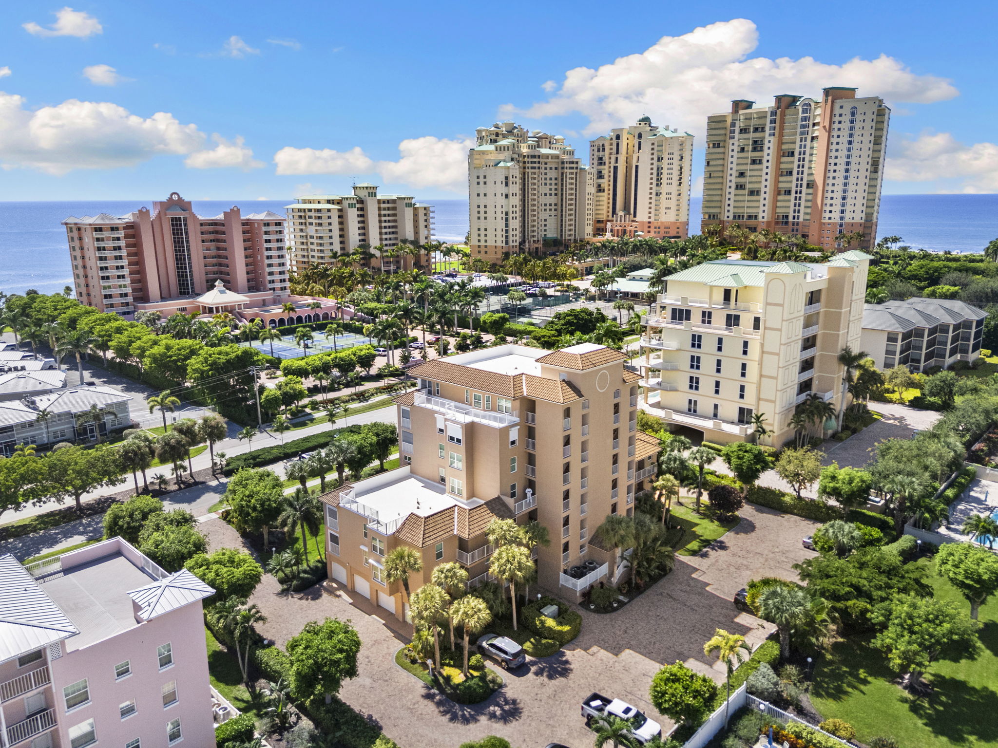 Surfwalk Marco Island Condo with 3 bedrooms, Gulf views, an extra-deep private garage, and easy access to South Beach and boating.